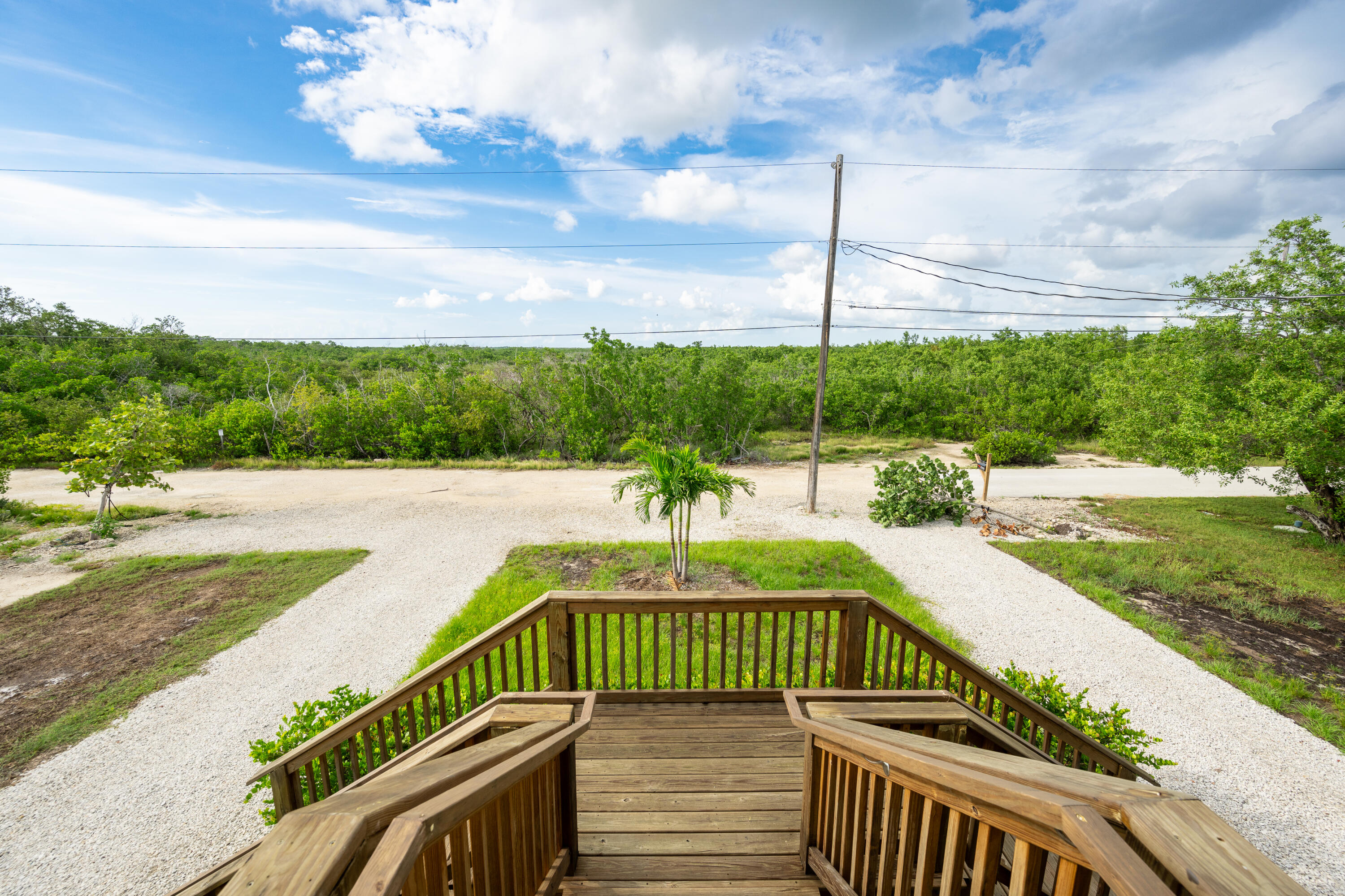26868 Mariposa Road Summerland Key, FL 33042 - Photo 3 of 30 a view of a swimming pool with a patio