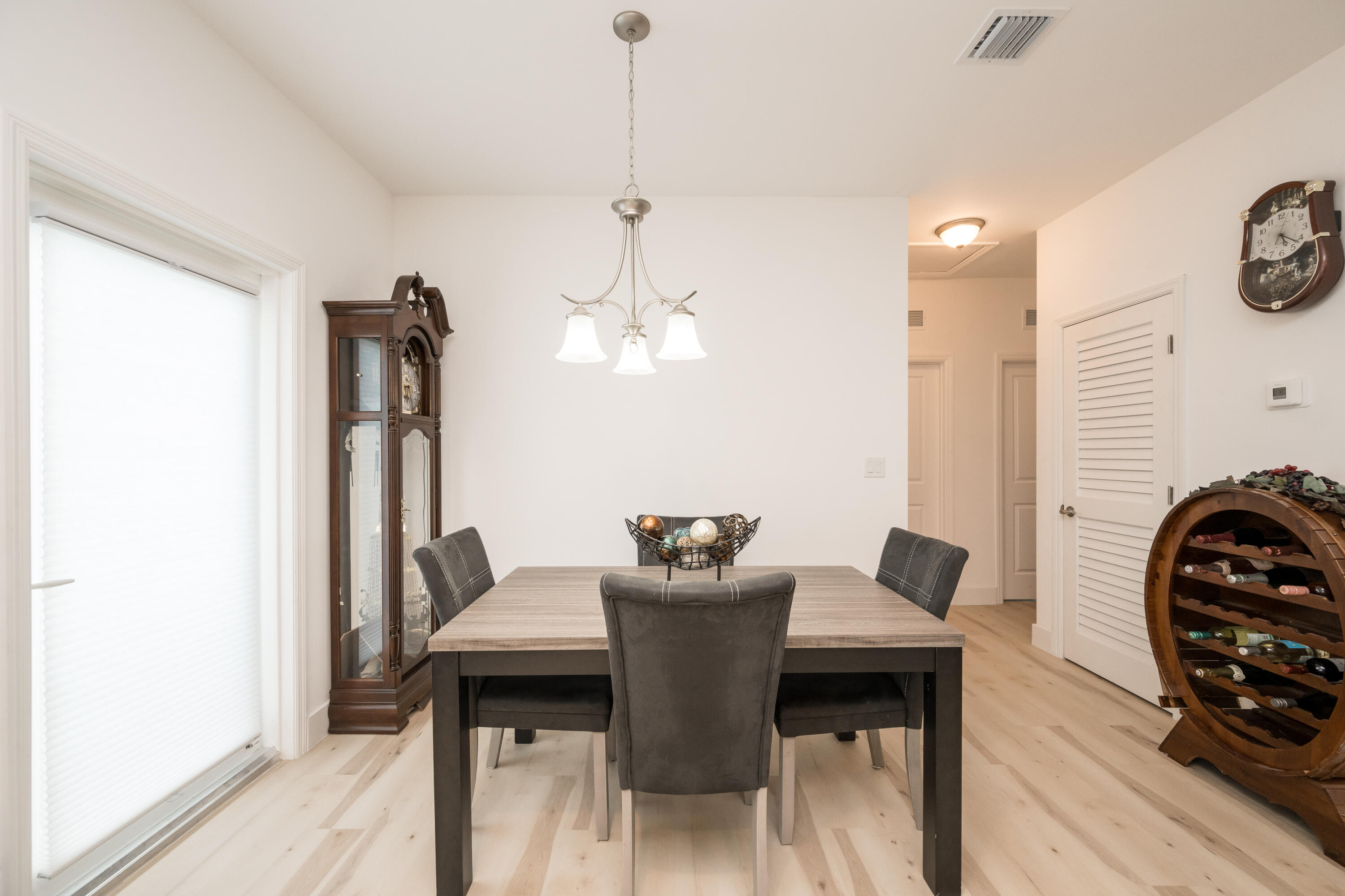 26868 Mariposa Road Summerland Key, FL 33042 - Photo 10 of 30 a view of a dining room with furniture and wooden floor