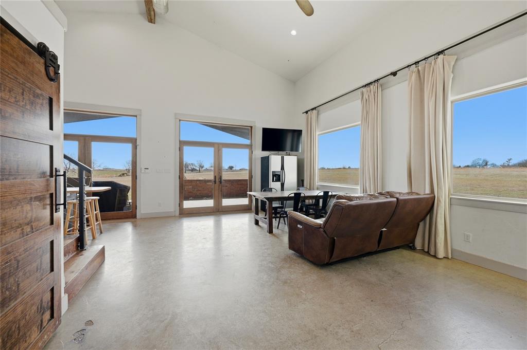 140 Turkey Farm Road Whitesboro, TX 76273 - Photo 13 of 38 a living room with furniture and a window