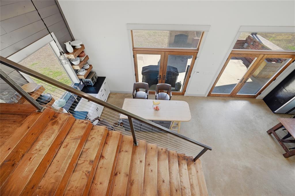 140 Turkey Farm Road Whitesboro, TX 76273 - Photo 18 of 38 a bathroom with a sink mirror and vanity