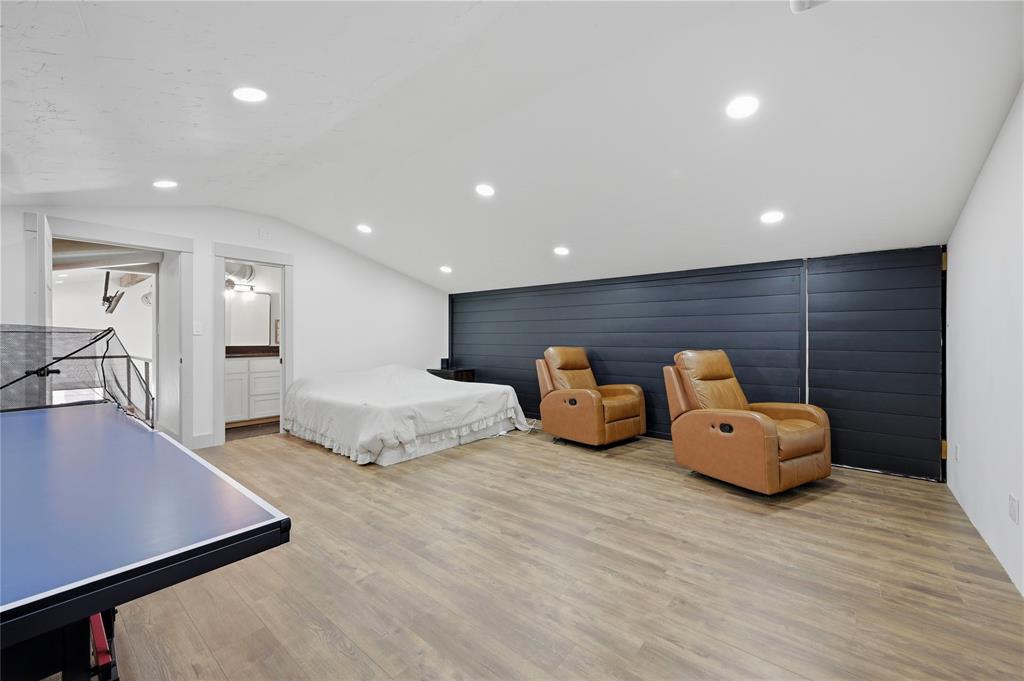 140 Turkey Farm Road Whitesboro, TX 76273 - Photo 21 of 38 a living room with furniture and wooden floor