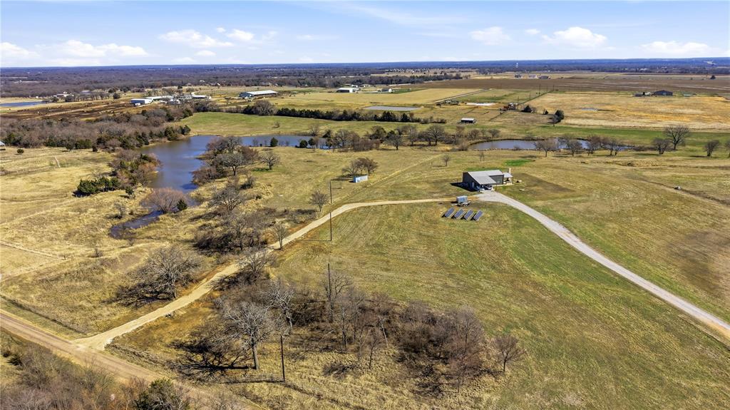 140 Turkey Farm Road Whitesboro, TX 76273 - Photo 34 of 38 a view of an ocean and beach