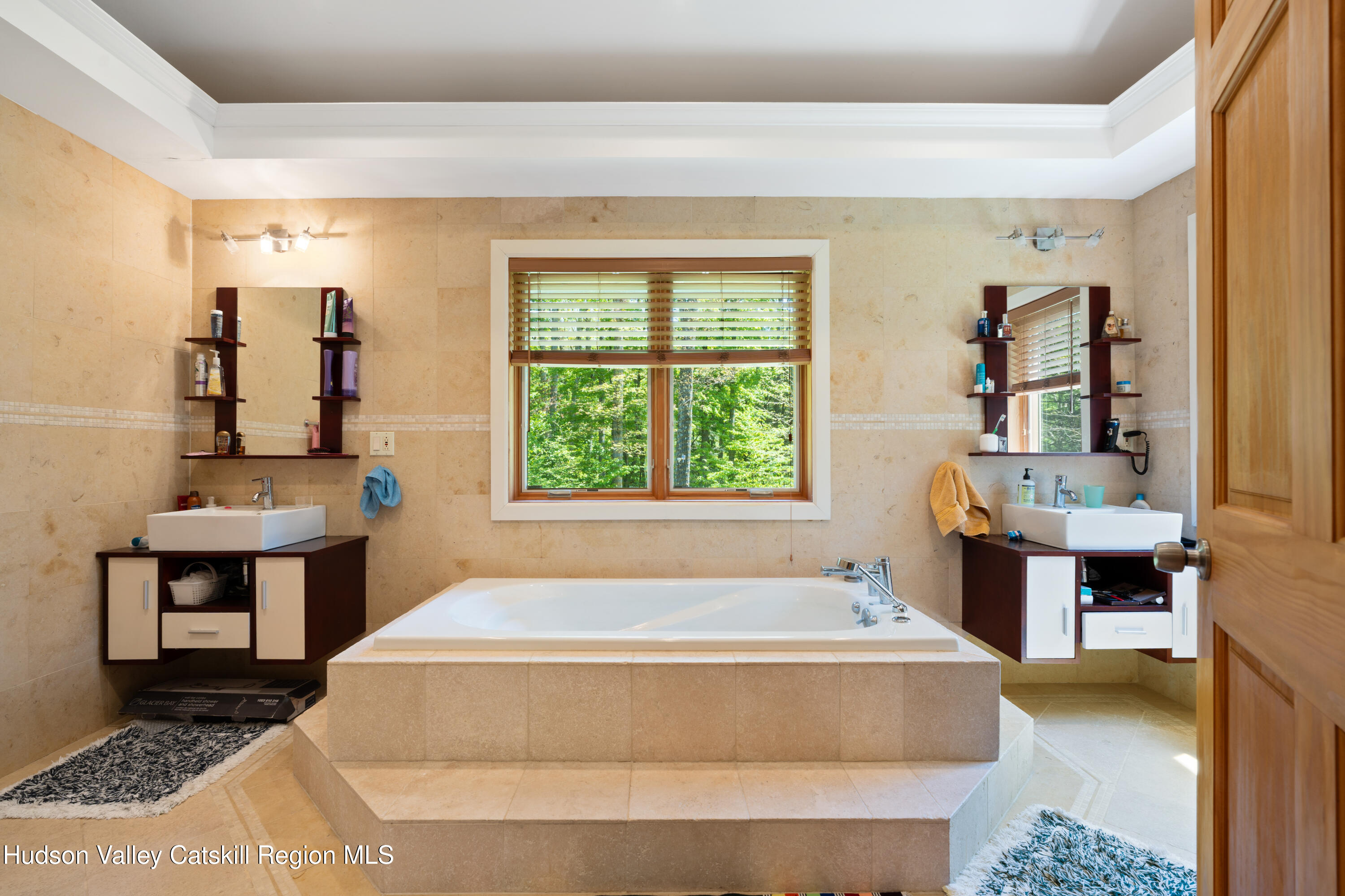 537 Mossy Hill Road Catskill, NY 12414 - Photo 66 of 105 a spacious bedroom with a bed and a table