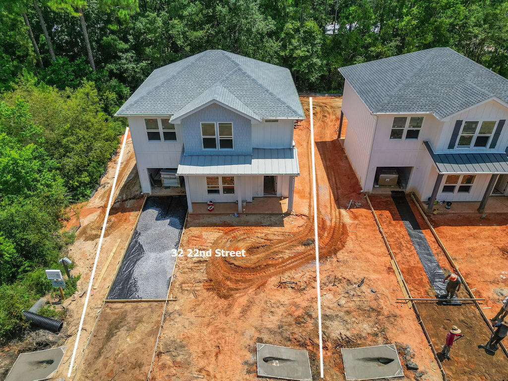 32 22nd Street Santa Rosa Beach, FL 32459 - Photo 1 of 26 a aerial view of a house with a yard