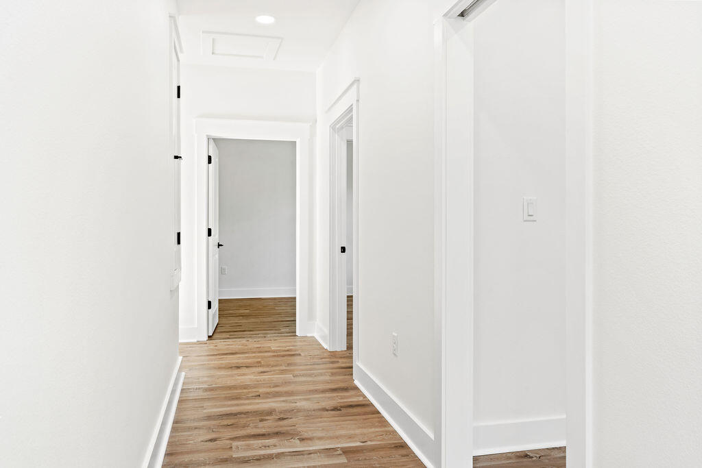 32 22nd Street Santa Rosa Beach, FL 32459 - Photo 11 of 26 a view of a hallway with wooden floor