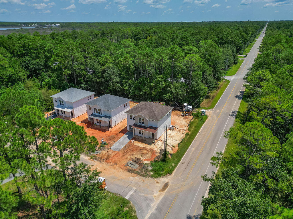 32 22nd Street Santa Rosa Beach, FL 32459 - Photo 23 of 26 an aerial view of a house with a yard