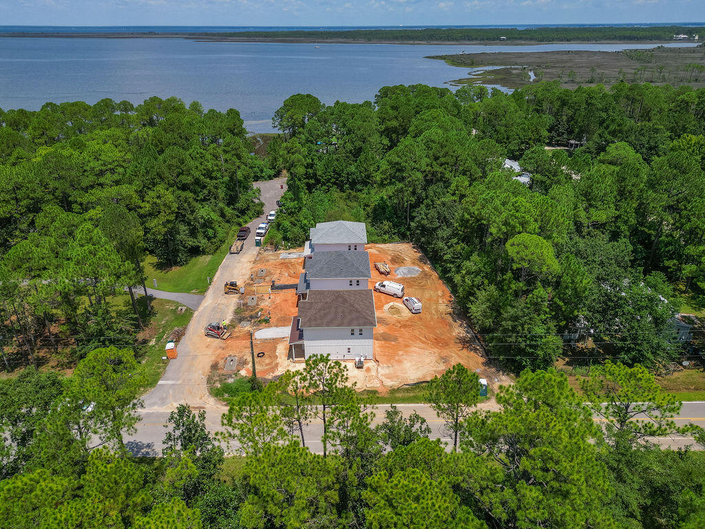 32 22nd Street Santa Rosa Beach, FL 32459 - Photo 25 of 26 a view of a yard with a house