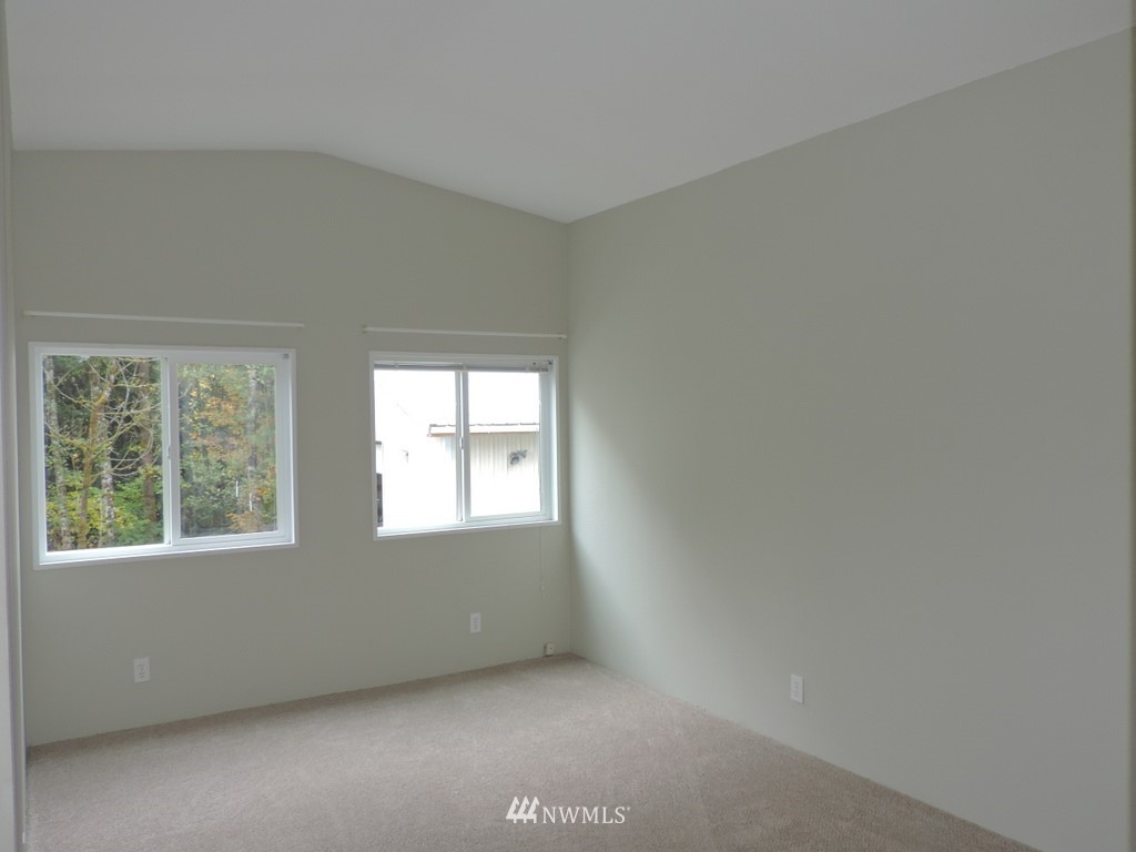 360 Hewitt Road Chehalis, WA 98532 - Photo 8 of 25 an empty room with a window