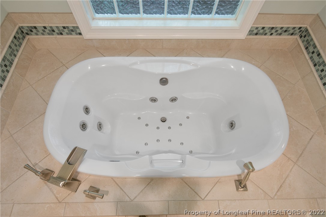 501 Rush Road Fayetteville, NC 28305 - Photo 29 of 50 a bathroom with a bathtub