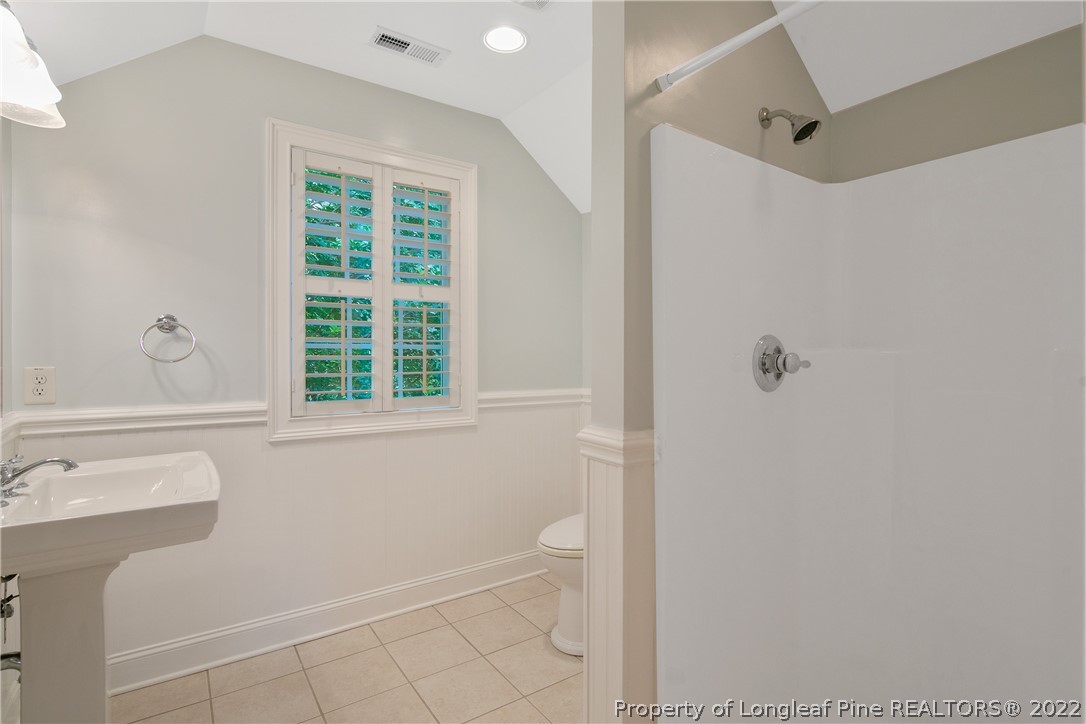 501 Rush Road Fayetteville, NC 28305 - Photo 41 of 50 a bathroom with a sink and a shower