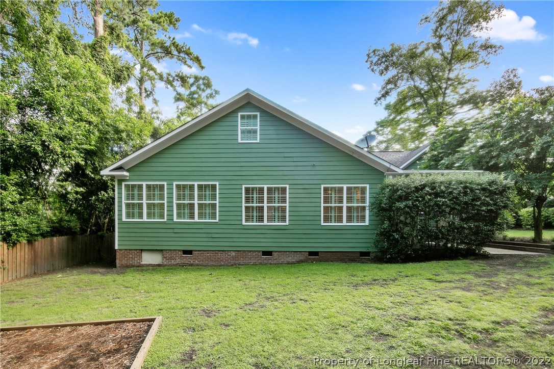 501 Rush Road Fayetteville, NC 28305 - Photo 47 of 50 a view of a house with a garden