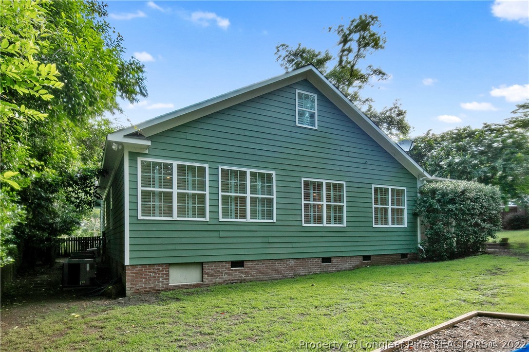 501 Rush Road Fayetteville, NC 28305 - Photo 49 of 50 a view of a house with a yard