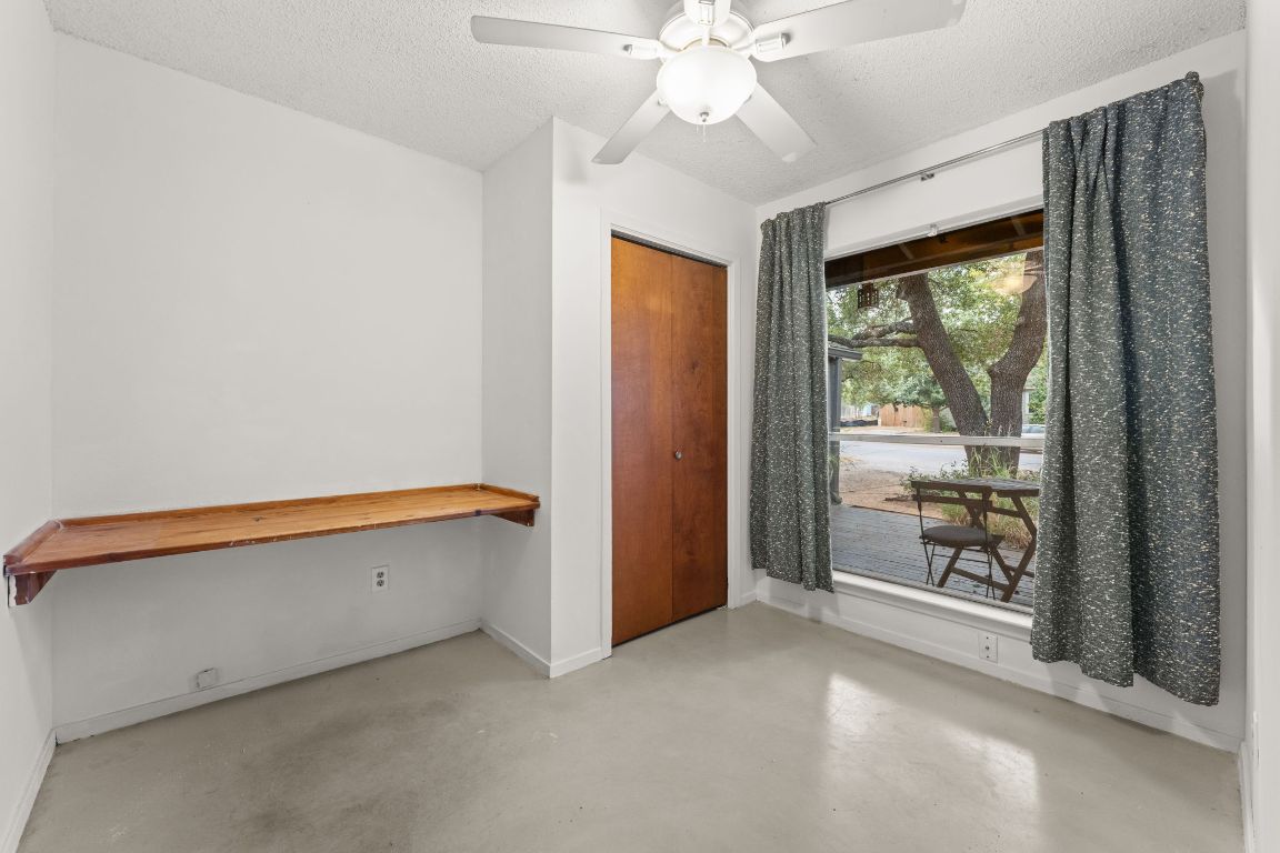 5413 Duval Street Austin, TX 78751 - Photo 15 of 27 a view of an empty room with a window