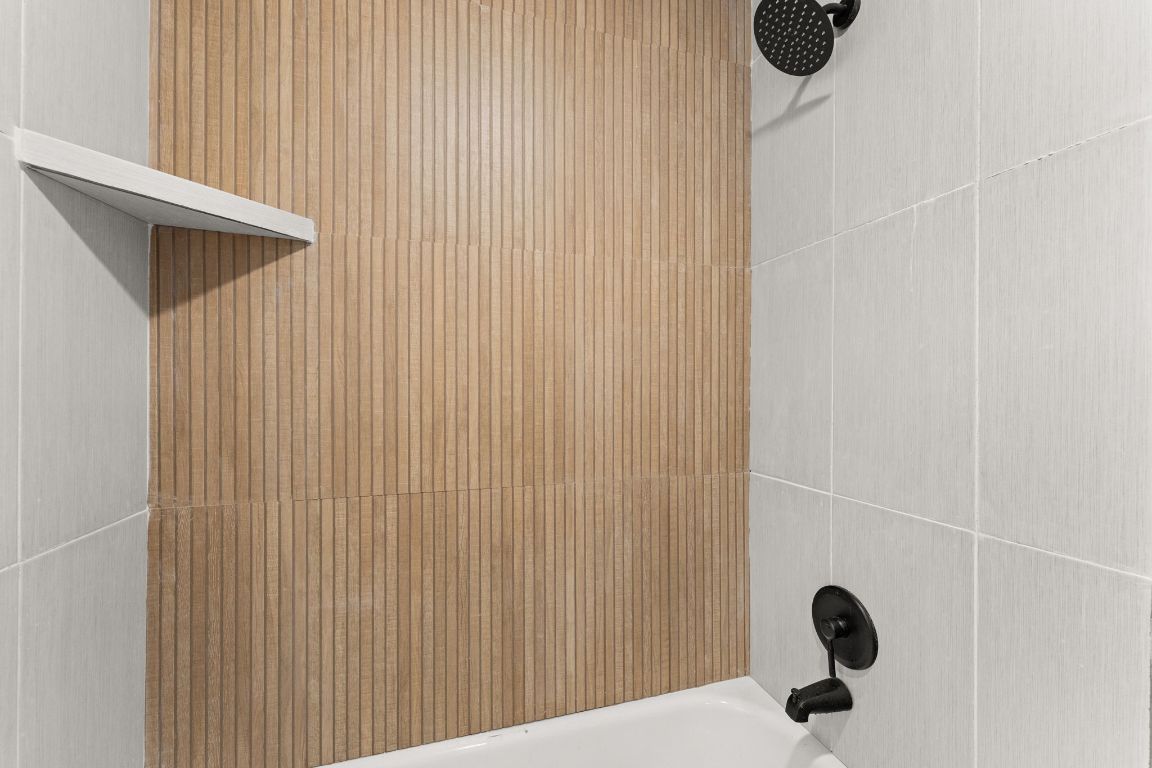 5413 Duval Street Austin, TX 78751 - Photo 17 of 27 a bathroom with a shower