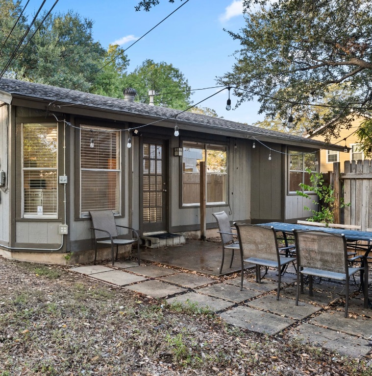 5413 Duval Street Austin, TX 78751 - Photo 27 of 27 a backyard of a house with yard and outdoor seating