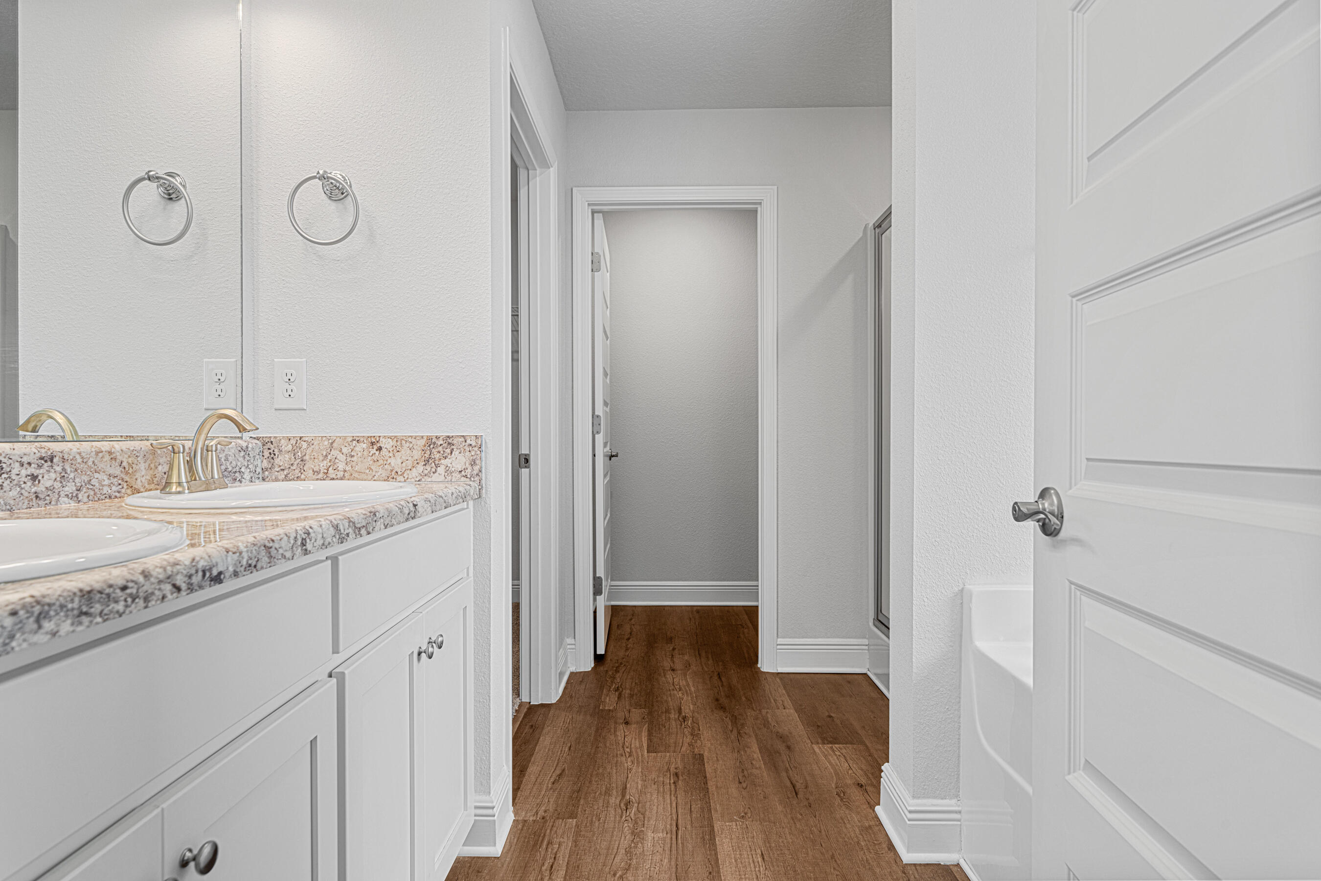 103 Ridgeway Circle Crestview, FL 32536 - Photo 22 of 33 a bathroom with a granite countertop sink a toilet and shower