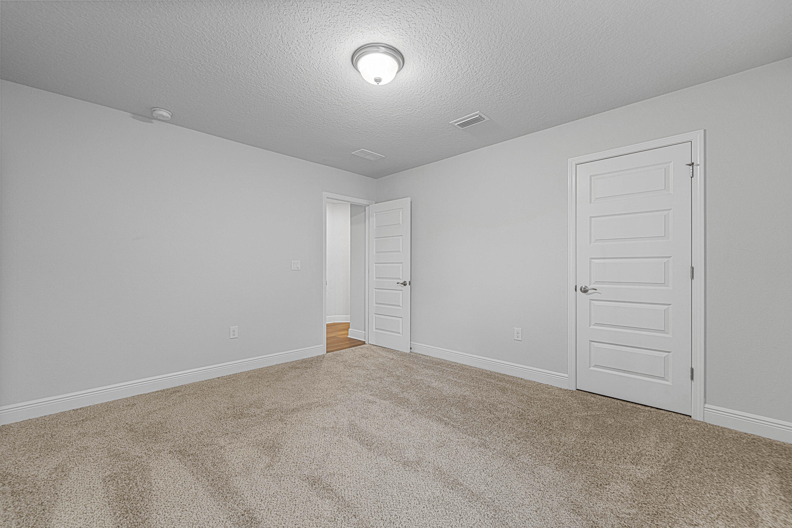 103 Ridgeway Circle Crestview, FL 32536 - Photo 26 of 33 wooden floor in an empty room