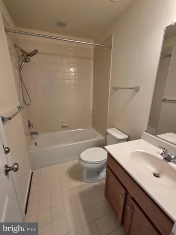 a view of backyard with wooden fences