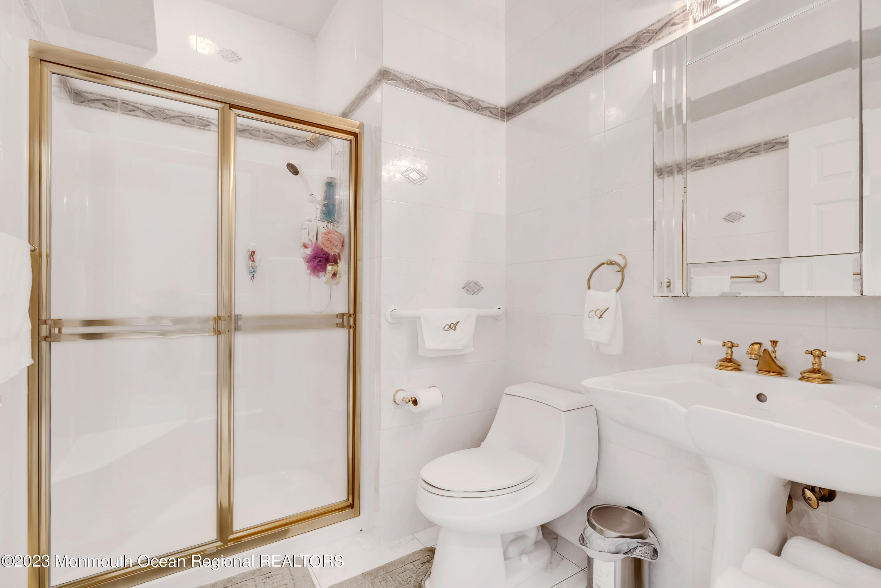 7 MacKenzie Road Eatontown, NJ 07724 - Photo 20 of 42 a bathroom with a sink toilet and shower