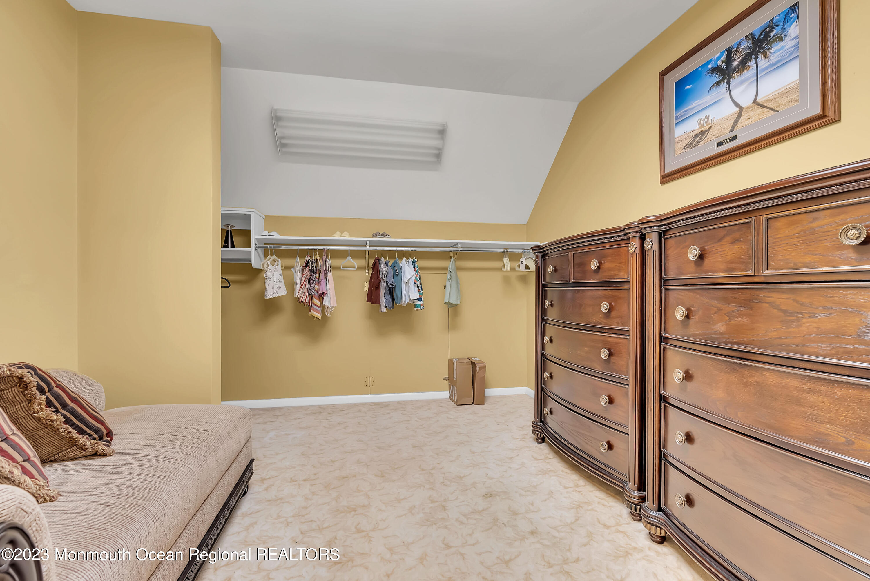 7 MacKenzie Road Eatontown, NJ 07724 - Photo 29 of 42 a bedroom with a bed and a cabinets