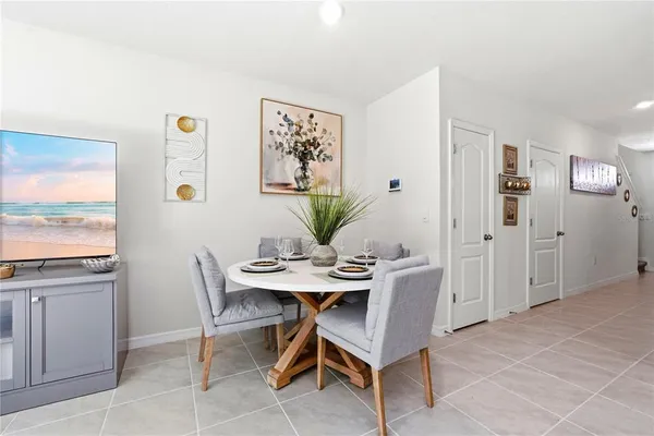 a view of a dining room with furniture