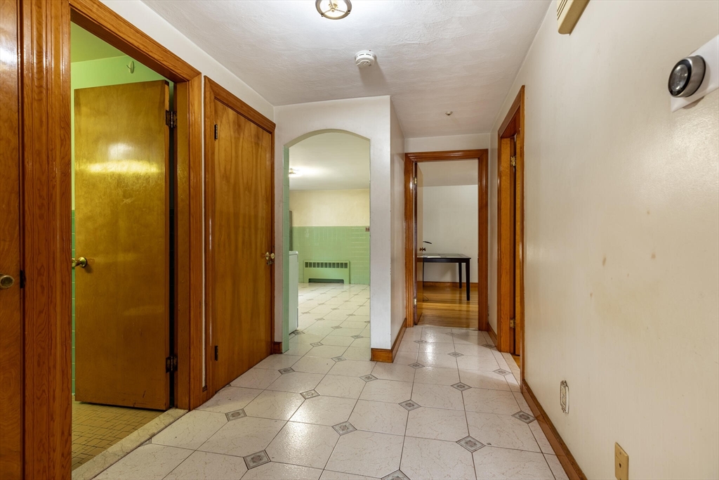 17 Albert Park Everett, MA 02149 - Photo 13 of 40 a view of a hallway with wooden shelves