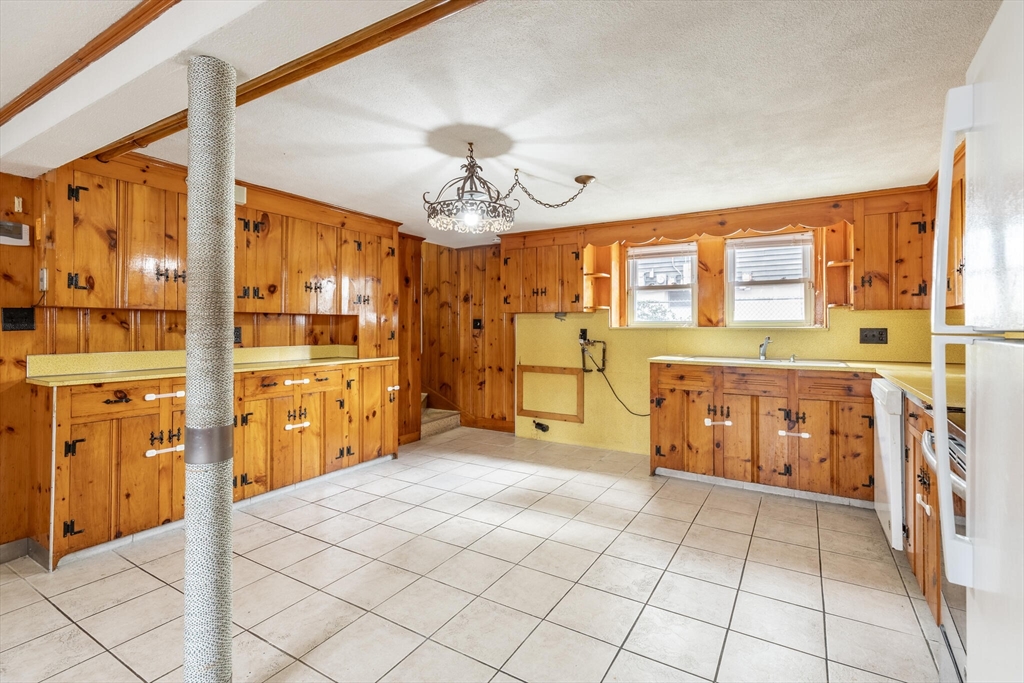17 Albert Park Everett, MA 02149 - Photo 26 of 40 a spacious bedroom with a bed and dresser