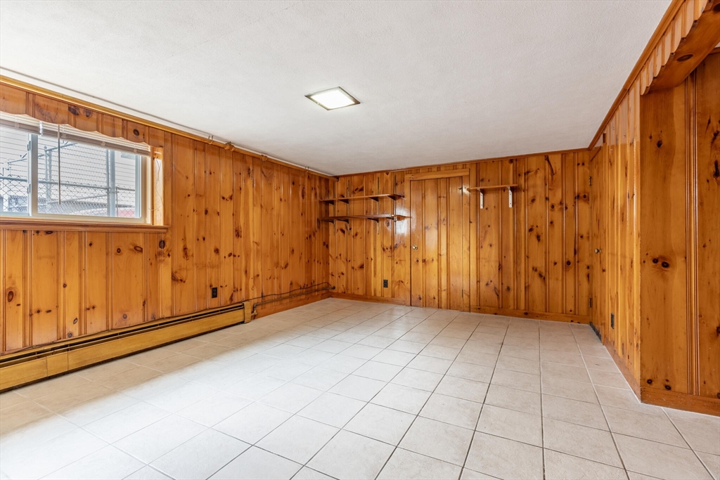17 Albert Park Everett, MA 02149 - Photo 32 of 40 a view of an empty room with wooden walls