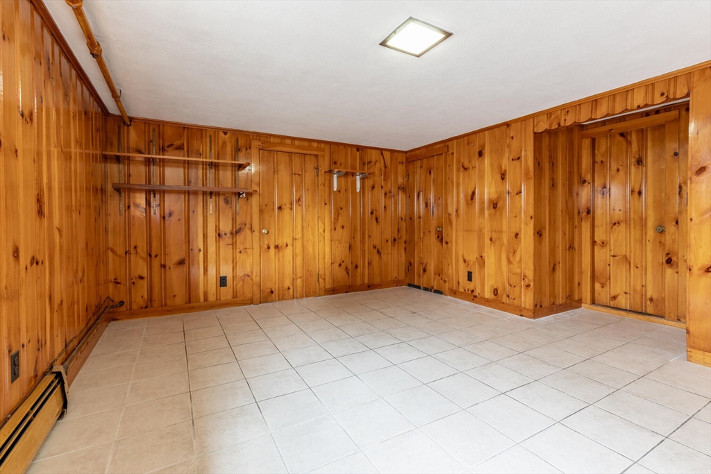 17 Albert Park Everett, MA 02149 - Photo 33 of 40 an empty room with a wooden door