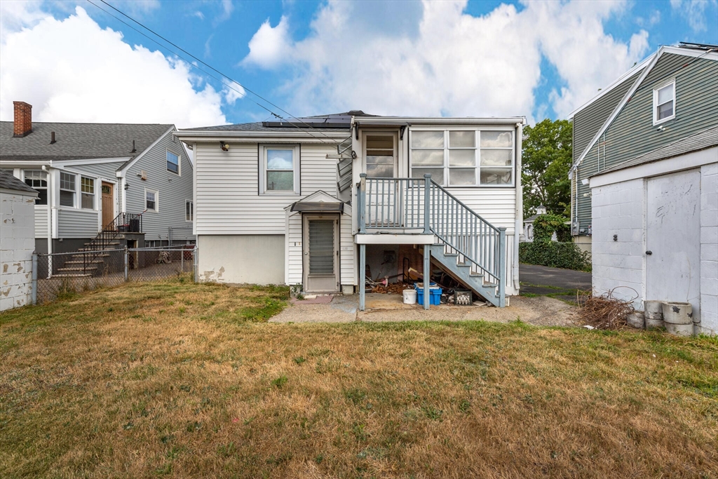 17 Albert Park Everett, MA 02149 - Photo 36 of 40 a view of a house with a yard and sitting area