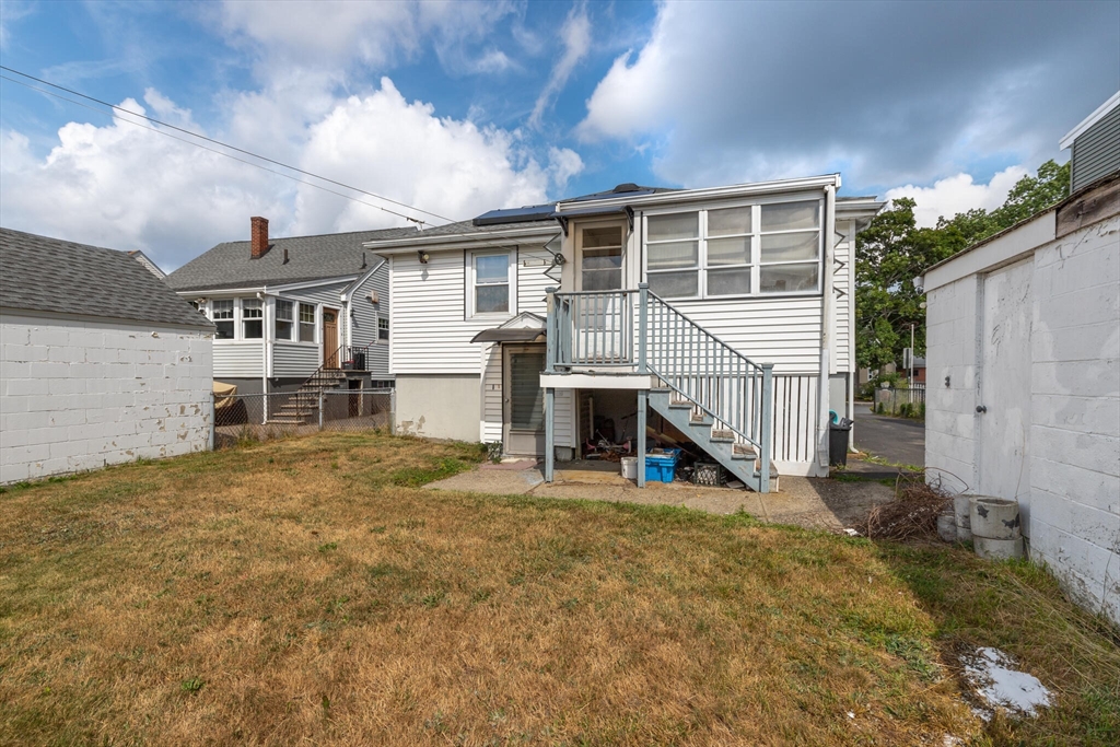 17 Albert Park Everett, MA 02149 - Photo 37 of 40 front view of a house with a small yard