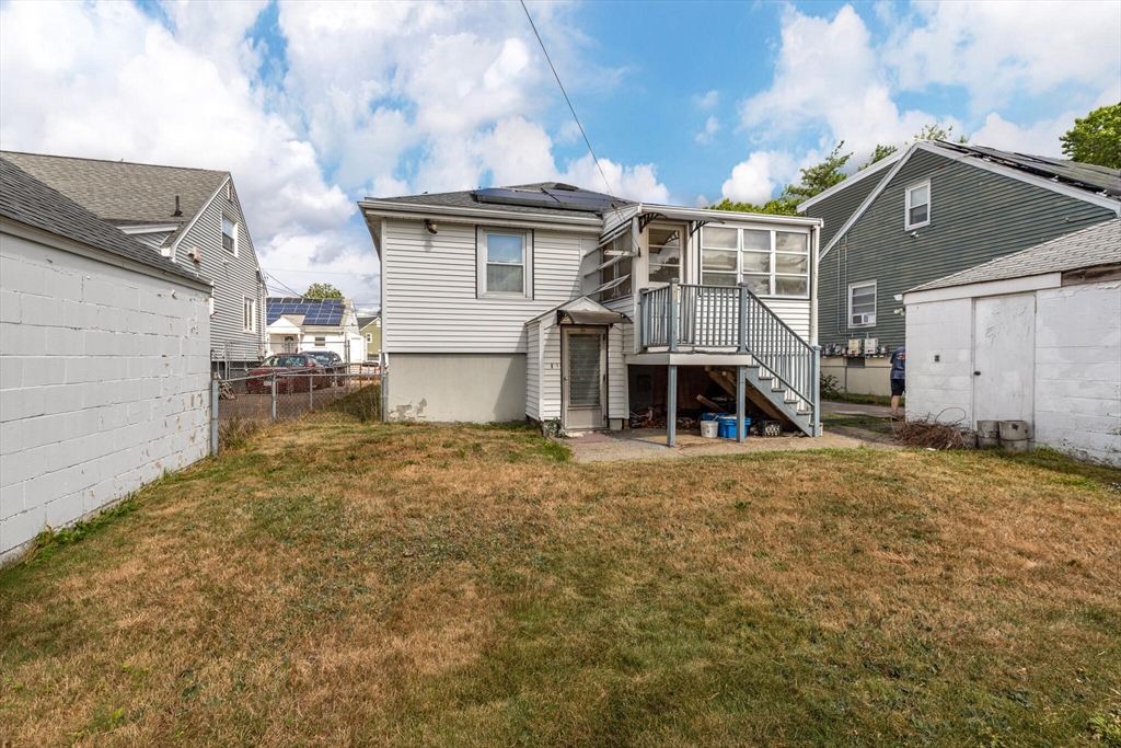 17 Albert Park Everett, MA 02149 - Photo 38 of 40 a view of a house with a yard