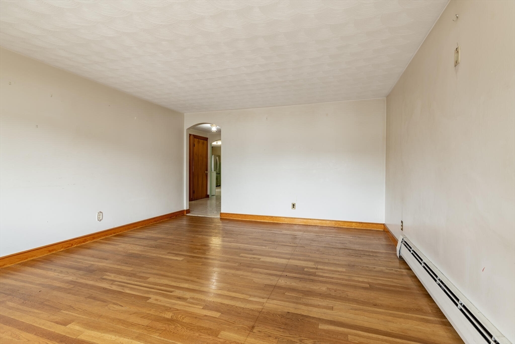 17 Albert Park Everett, MA 02149 - Photo 9 of 40 a view of empty room with wooden floor