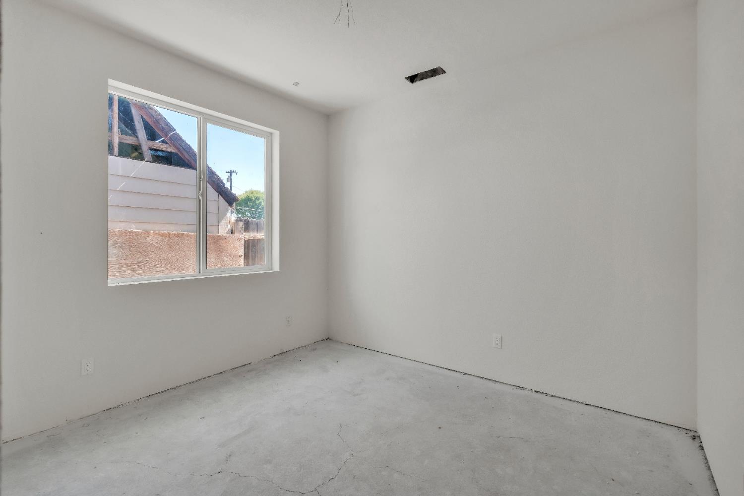 4688 Pacific Avenue Olivehurst, CA 95961 - Photo 65 of 91 an empty room with a window