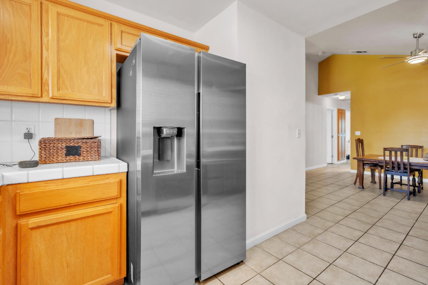 4688 Pacific Avenue Olivehurst, CA 95961 - Photo 74 of 91 a kitchen with a refrigerator and cabinets