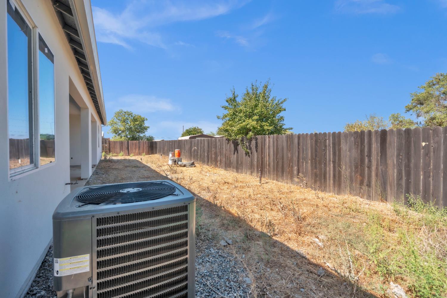 4688 Pacific Avenue Olivehurst, CA 95961 - Photo 88 of 91 a backyard of a house with table and chairs