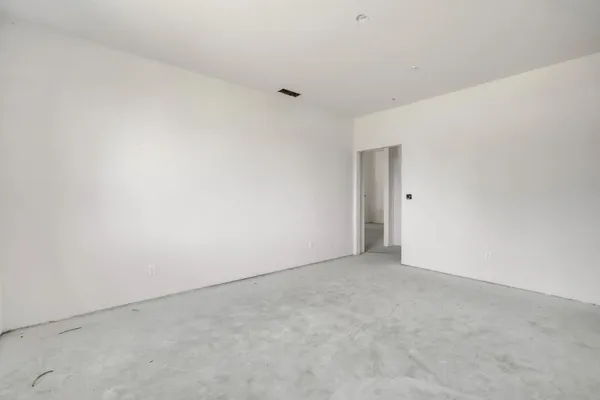 a view of water heater room with windows