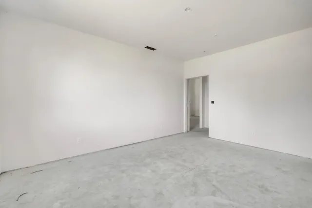 a view of water heater room with windows