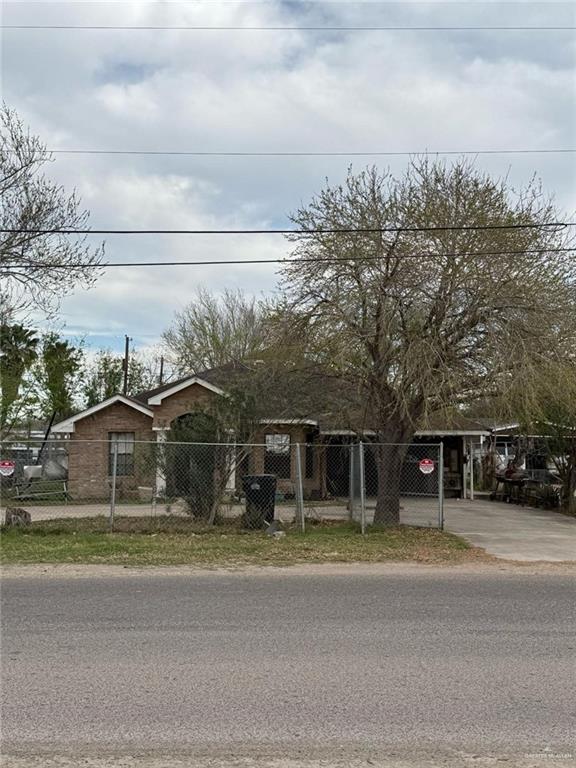 4706 North Trosper Road Mission, TX 78573 - Photo 2 of 15 a front view of a house with a garden