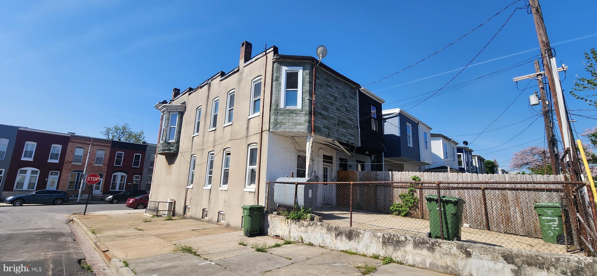 1746 East Oliver Street Baltimore, MD 21213 - Photo 16 of 17 a view of a street with buildings