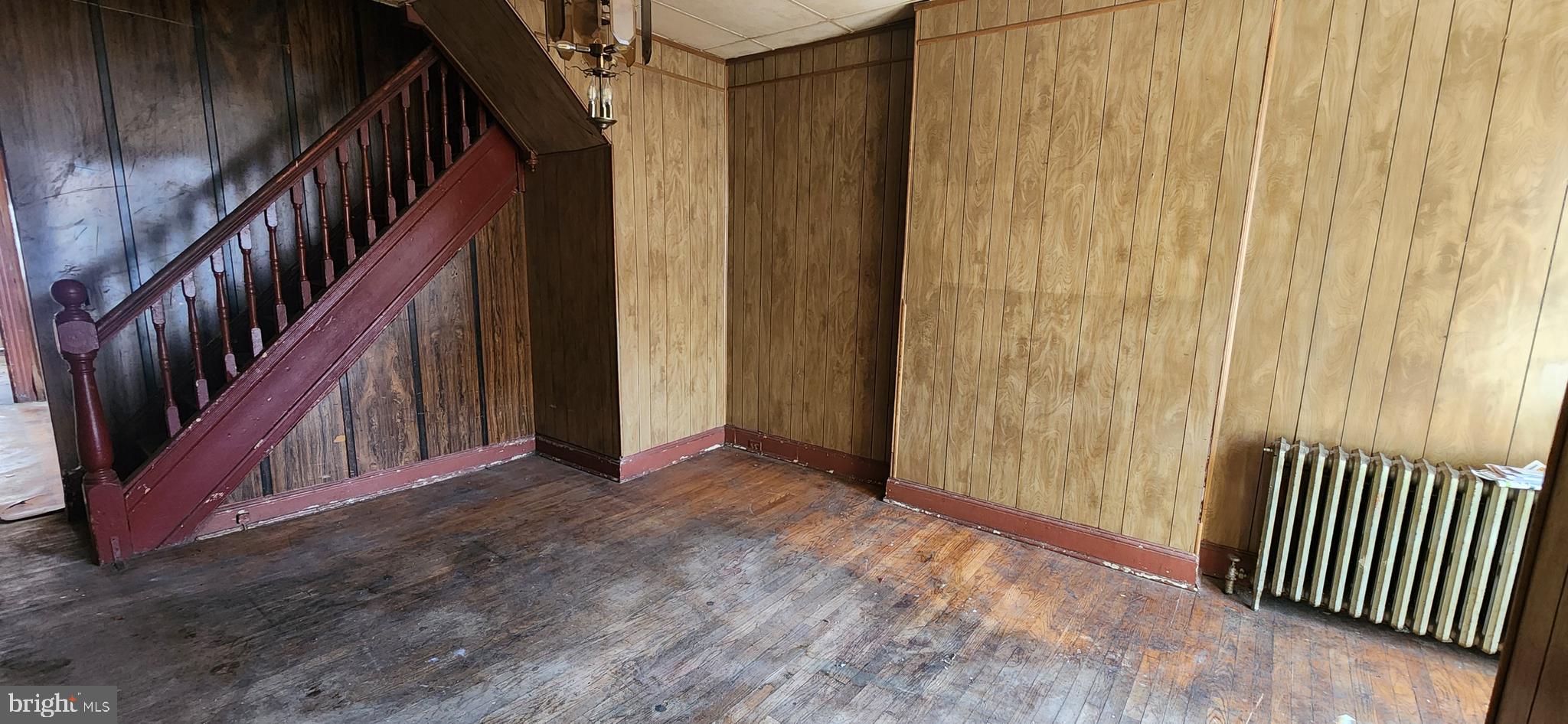 1746 East Oliver Street Baltimore, MD 21213 - Photo 5 of 17 a view of an entryway with staircase