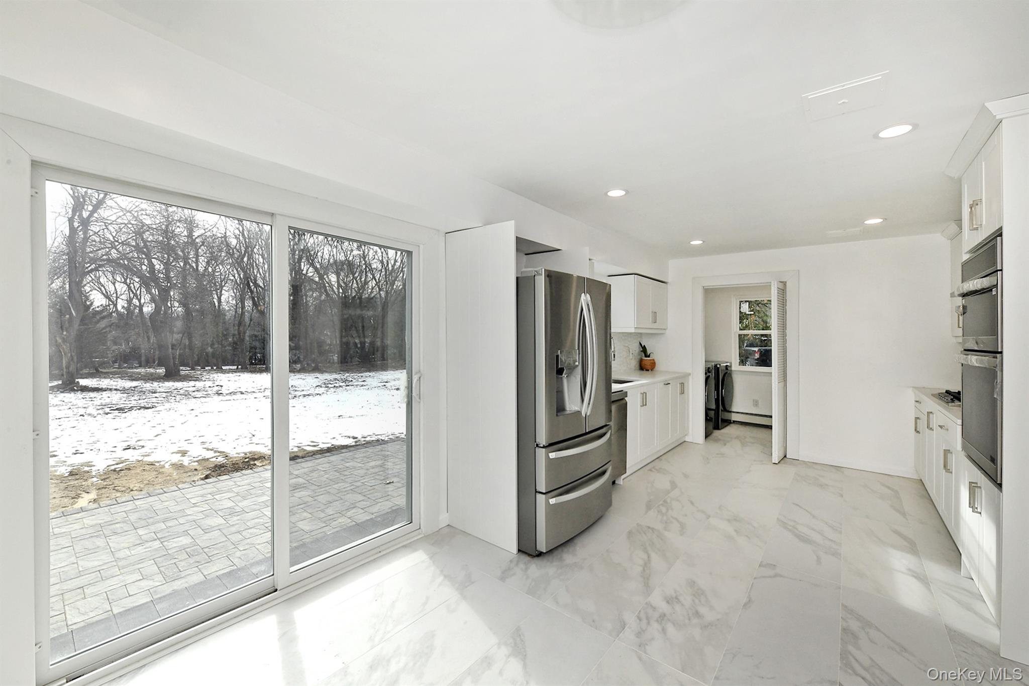 34 Warner Road Huntington, NY 11743 - Photo 11 of 39 a view of livingroom with an empty space and a window