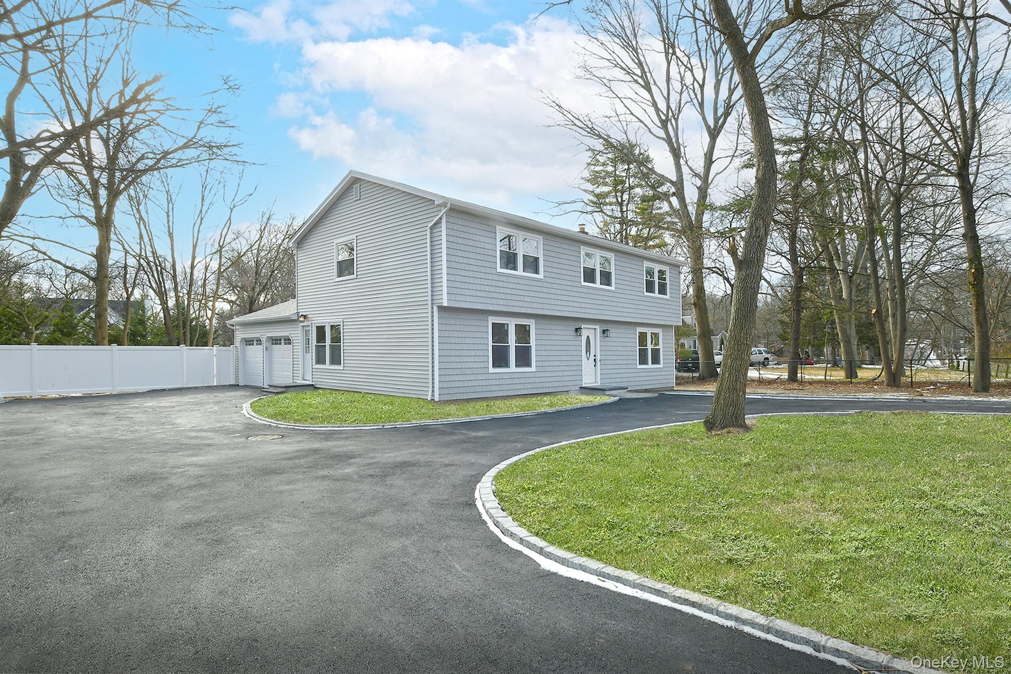 34 Warner Road Huntington, NY 11743 - Photo 2 of 39 a view of a house with a swimming pool