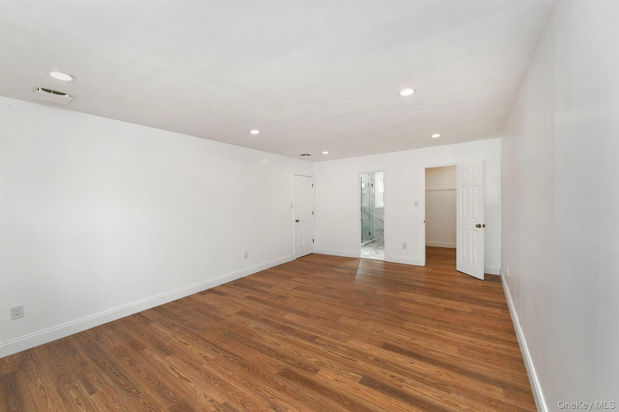 34 Warner Road Huntington, NY 11743 - Photo 26 of 39 a view of an empty room with wooden floor