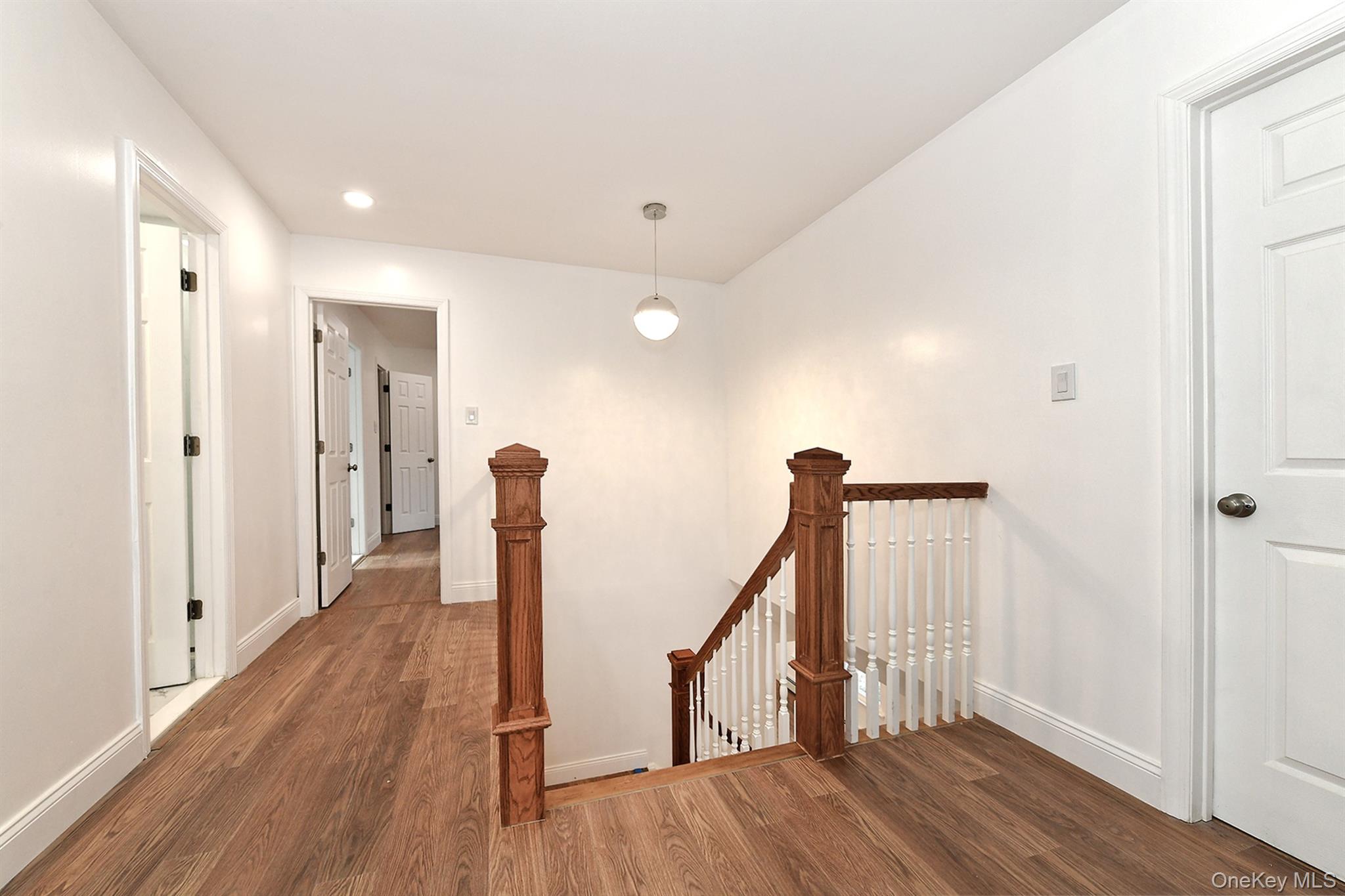34 Warner Road Huntington, NY 11743 - Photo 30 of 39 a view of a hallway with wooden floor and entryway