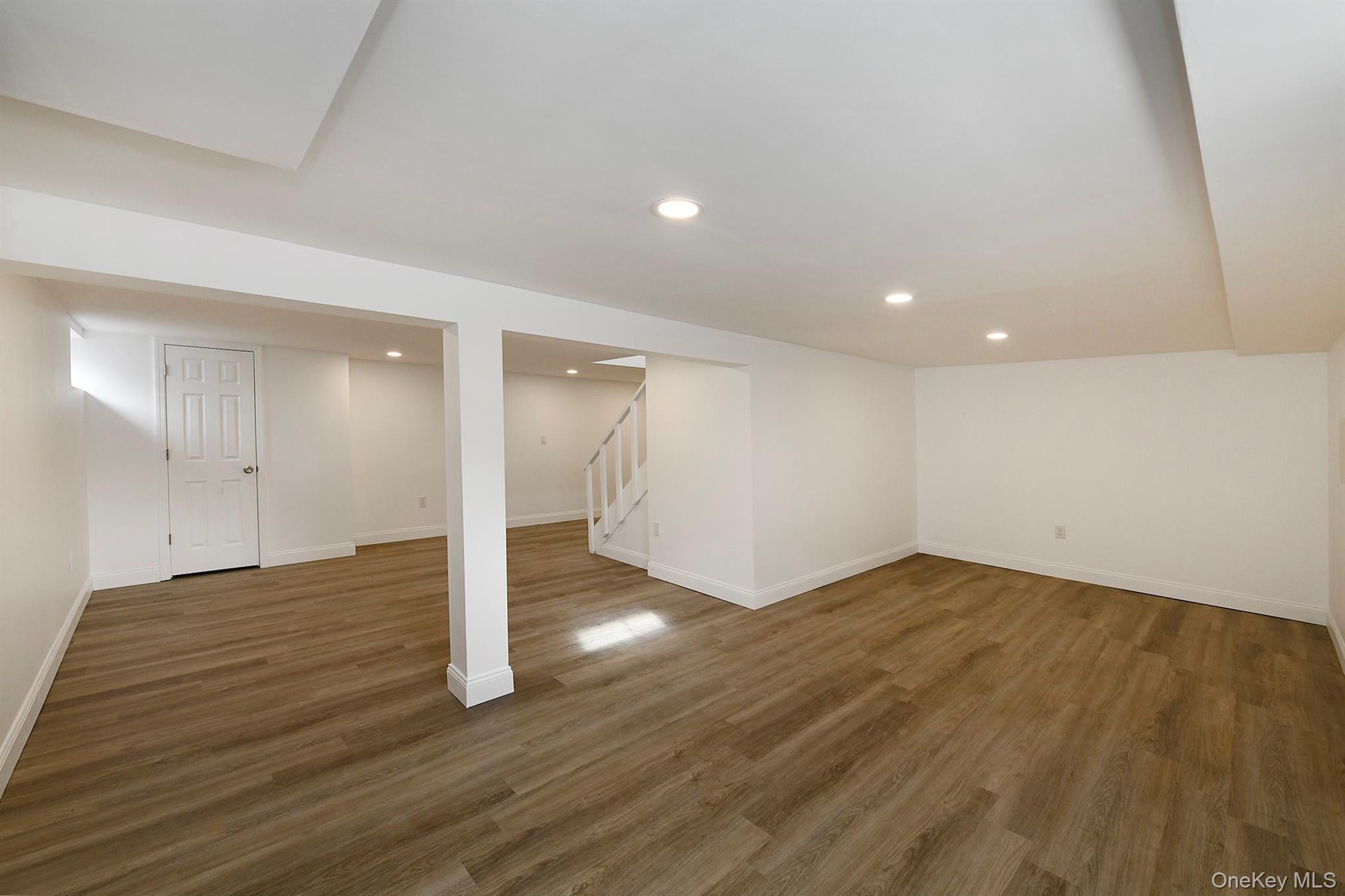 34 Warner Road Huntington, NY 11743 - Photo 33 of 39 a view of an empty room with wooden floor