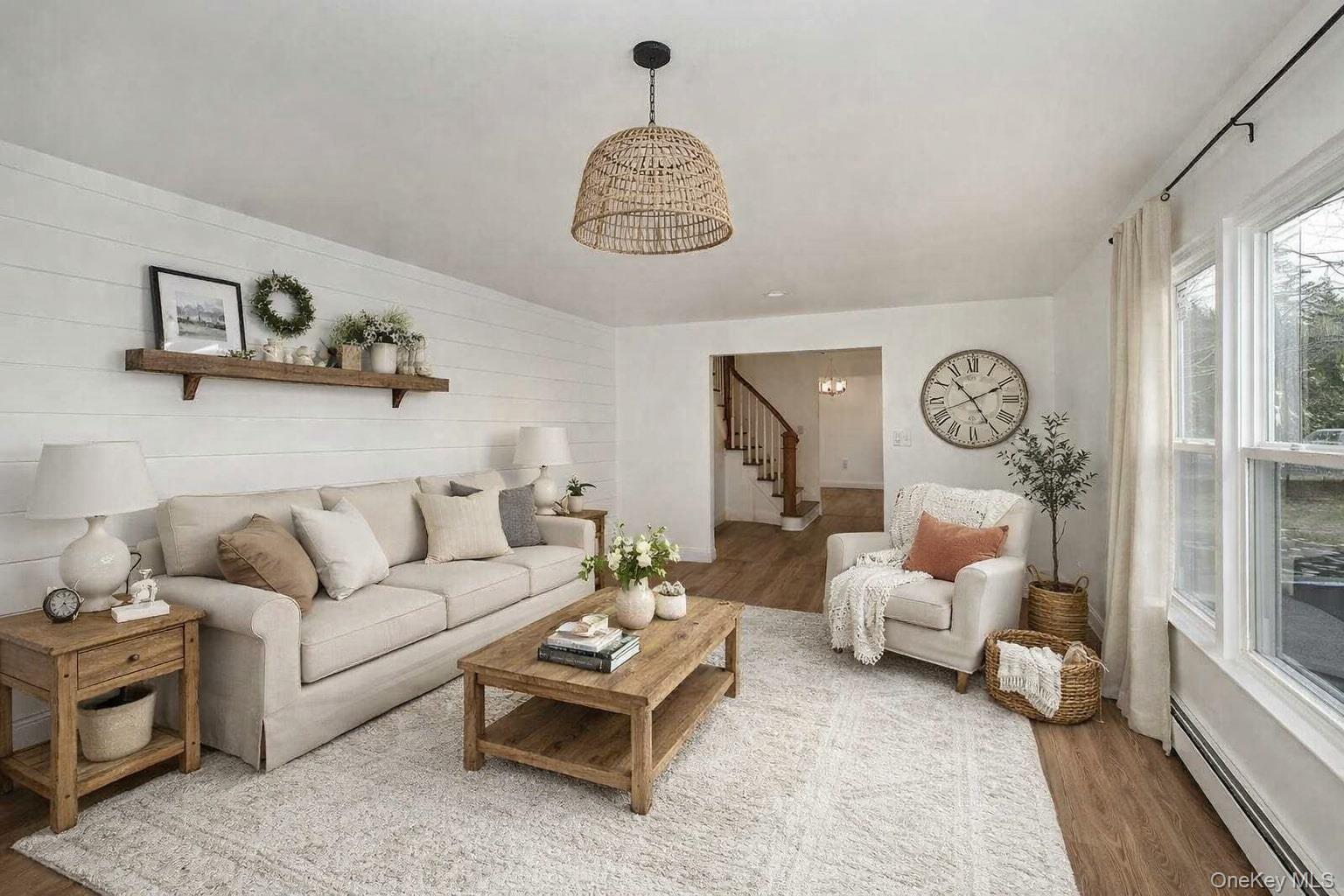 34 Warner Road Huntington, NY 11743 - Photo 8 of 39 a living room with furniture a rug and a window