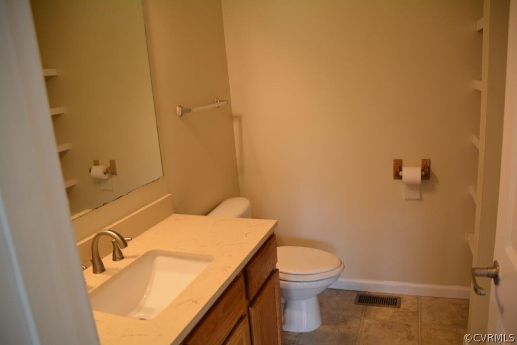 2372 Stage Coach Road Farmville, VA 23901 - Photo 8 of 13 a bathroom with a sink a toilet and shower