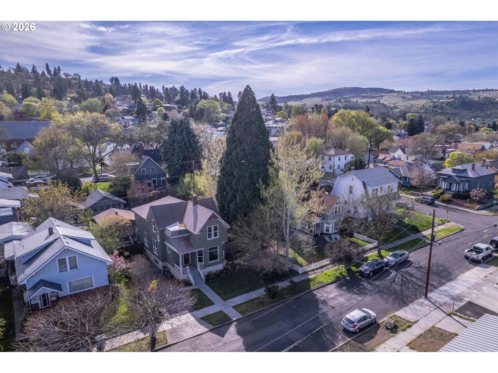 110 West 8th Street The Dalles, OR 97058 - Photo 40 of 43 an aerial view of a house with a garden