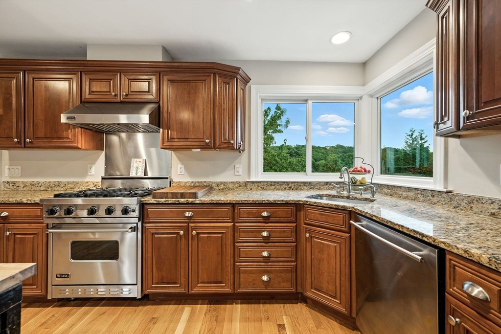 52 Wenham Road Topsfield, MA 01983 - Photo 12 of 42 a kitchen with a stove sink and window